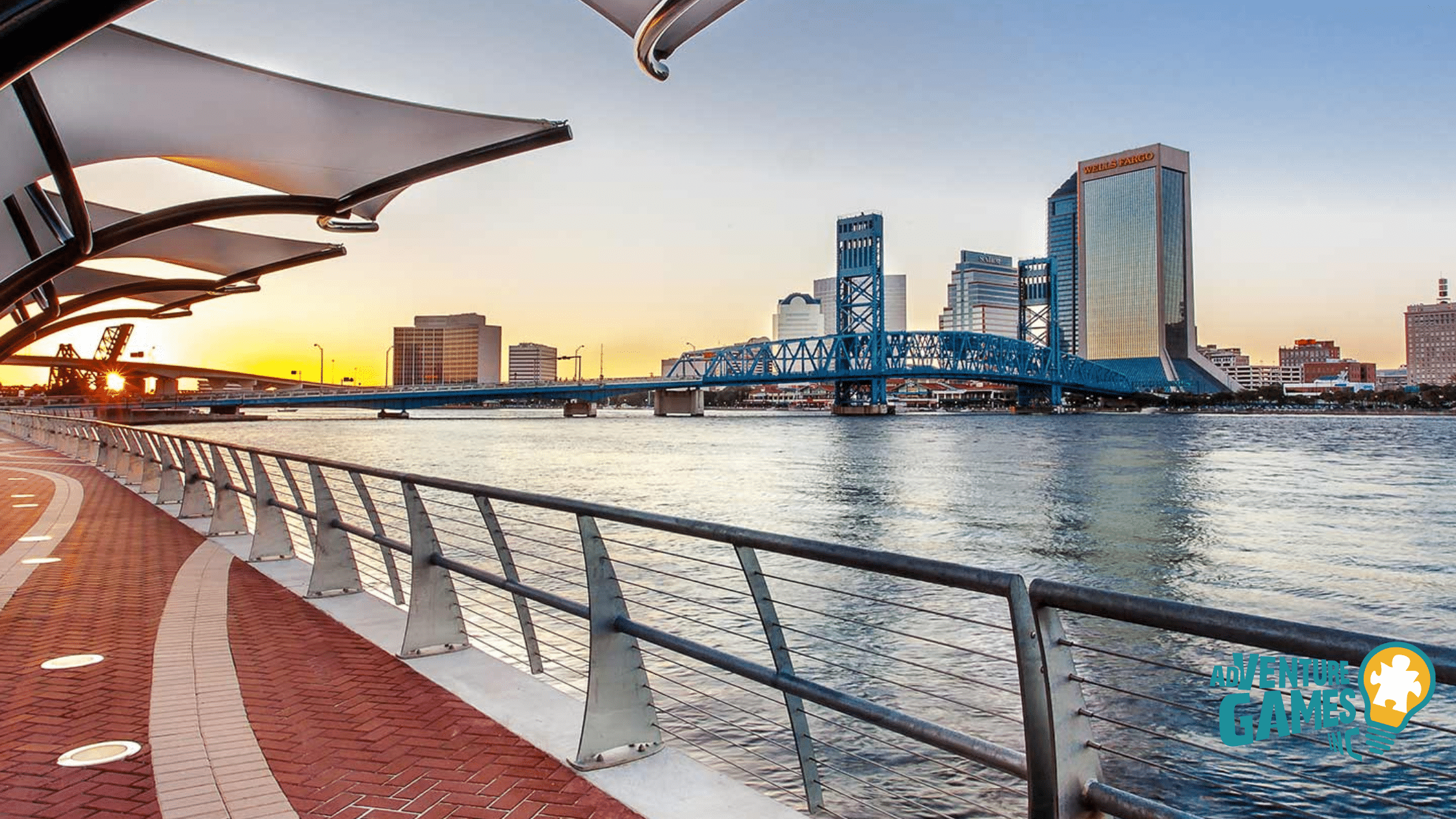 Best Team Building Jacksonville FL by Adventure Games Inc, downtown Jacksonville skyline and Main Street Bridge over the St Johns River viewed from the Riverwalk