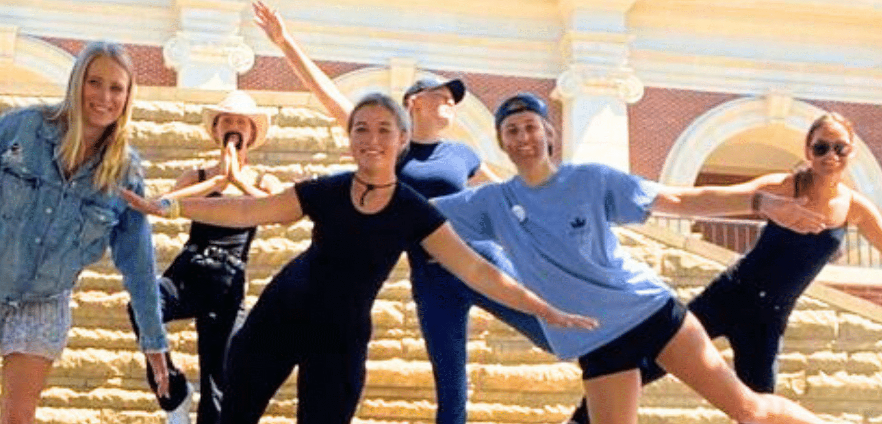 Employees showcasing success during a high-energy team building event run by Adventure Games Inc, a top-rated provider of team connection experiences