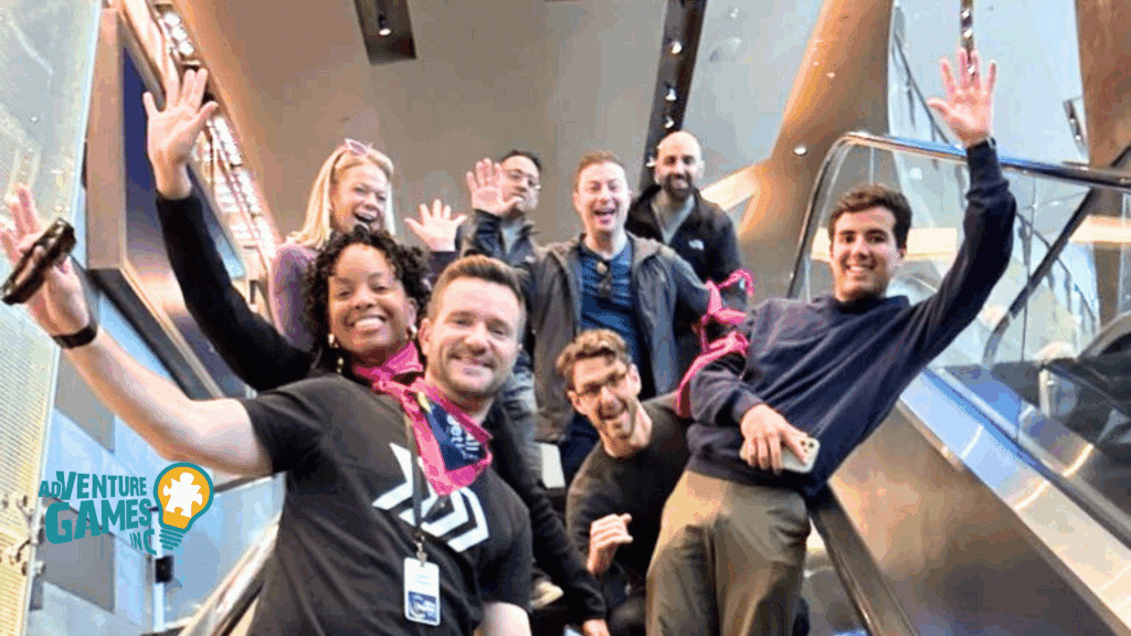 A lively group of coworkers waves from an escalator during a fast-paced, citywide team-building event organized by Adventure Games Inc.