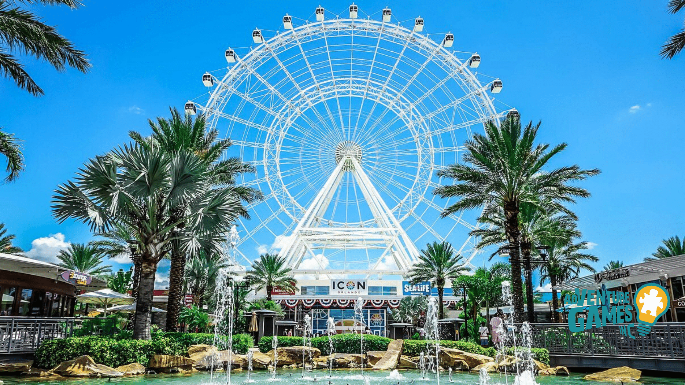The Orlando Eye rising above palm trees and fountains at Icon Park Florida as a backdrop for an outdoor team building experience