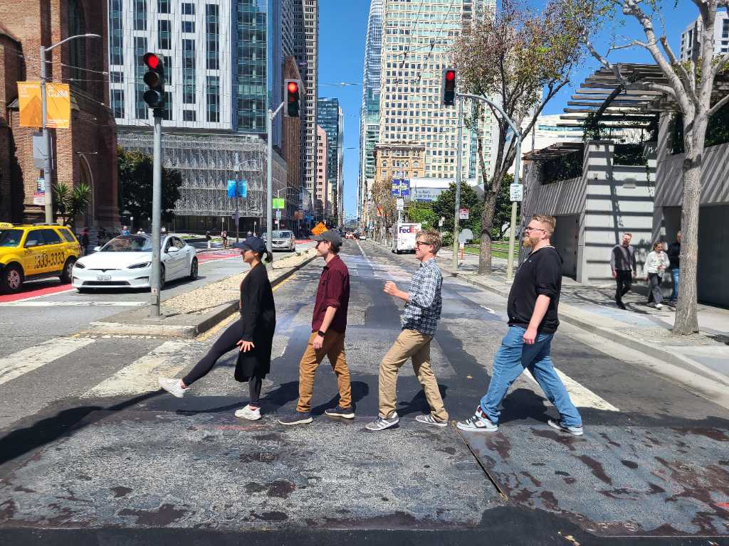 A creative street-crossing challenge inspired by the Beatles’ Abbey Road, showcasing teamwork and fun during an Adventure Games Inc. Bay Area event.