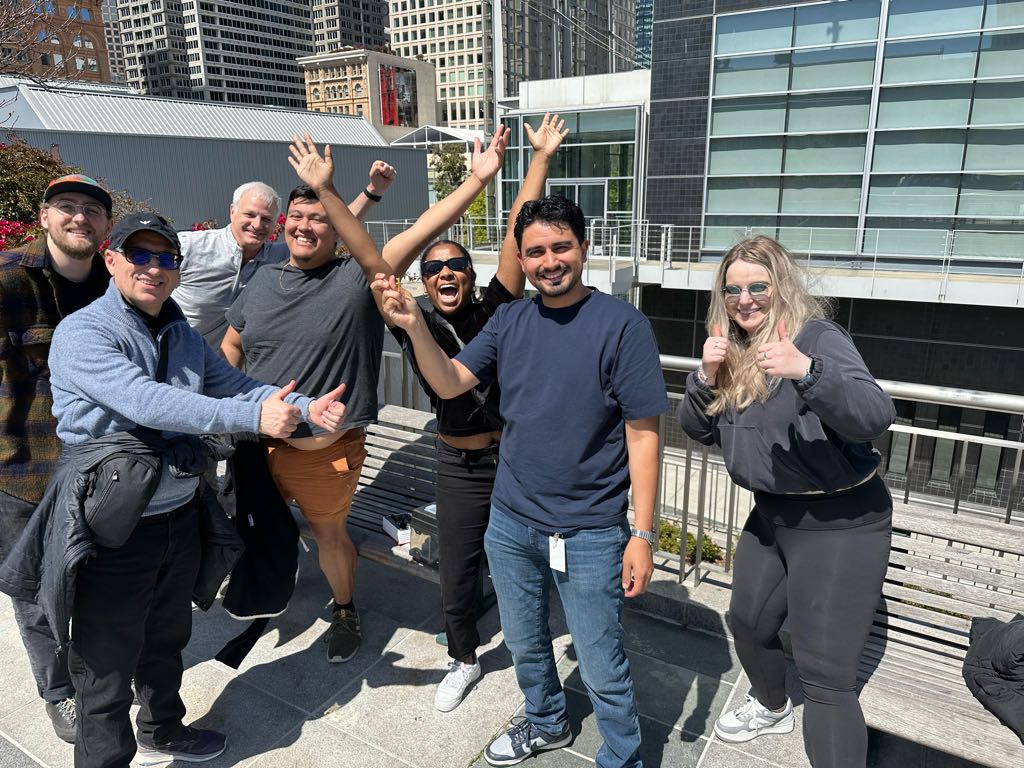 Teams cheer and pose together after completing a mission during Adventure Games Inc.’s Special Ops challenge, proving why it delivers the best team building in the Bay Area.