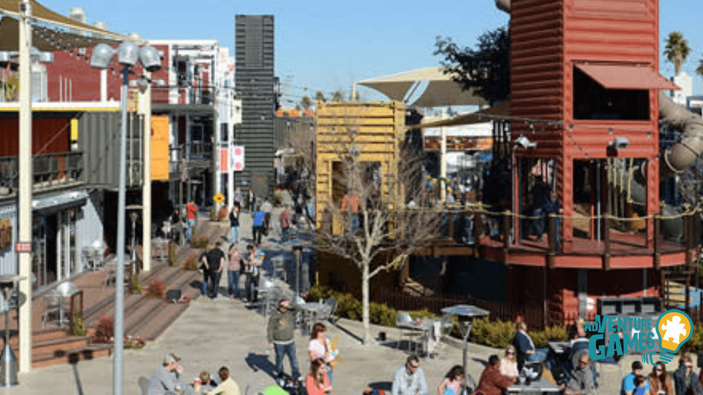 Best Team Building Las Vegas NV by Adventure Games Inc, Downtown Container Park and Fremont East with container shops, play structures, and crowds
