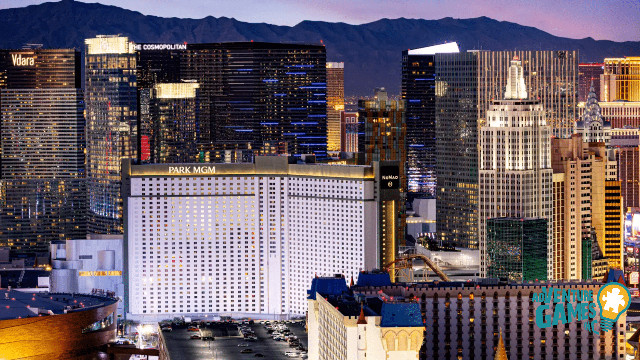 Best Team Building Las Vegas NV by Adventure Games Inc, The Park at MGM with Park MGM hotel and Las Vegas Strip skyline illuminated at night
