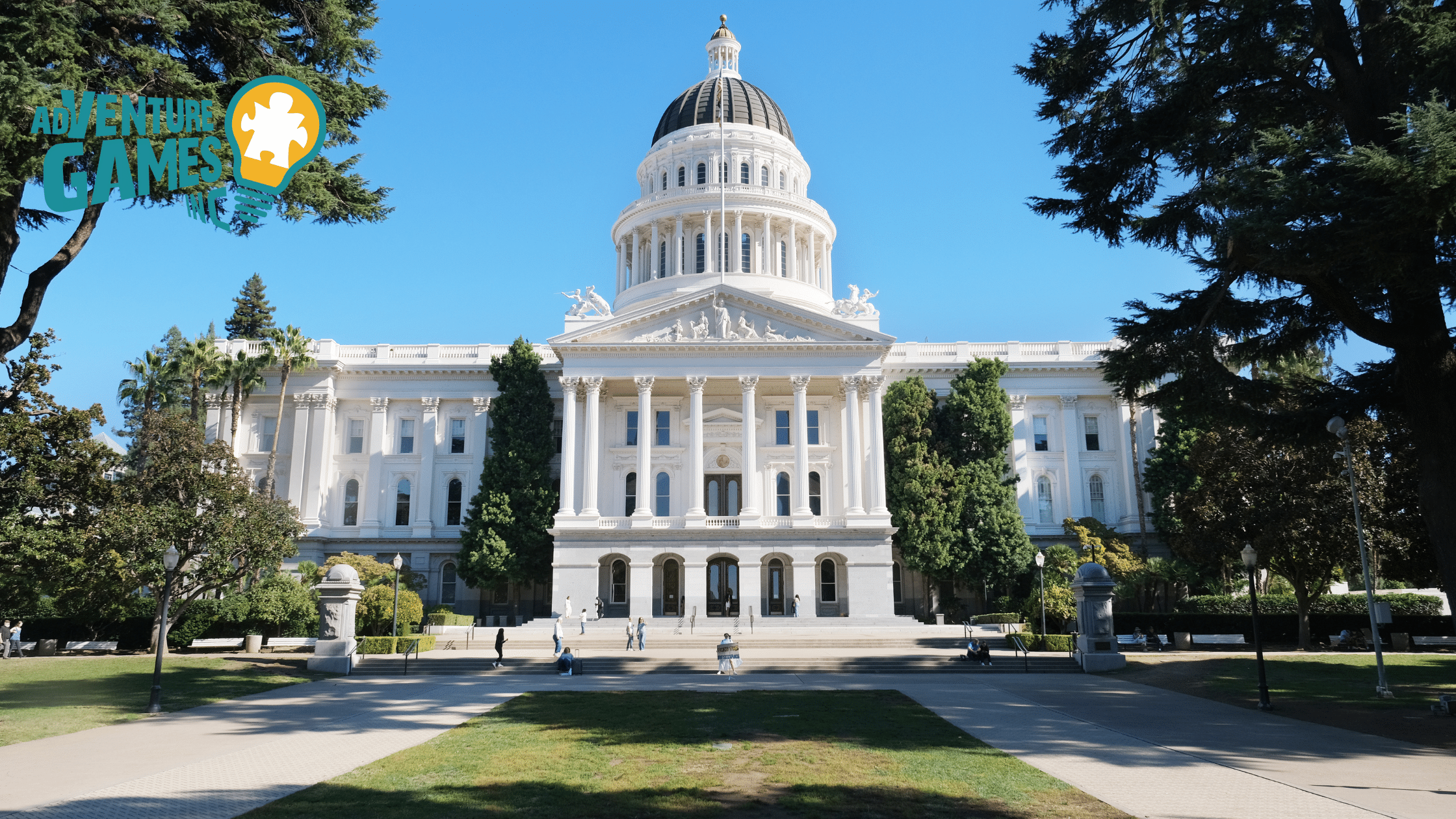 White domed California State Capitol on a sunny day in downtown Sacramento.